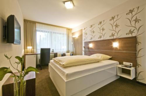 Hotel Am Rosenberg Бад-Дрибург Экстерьер фото